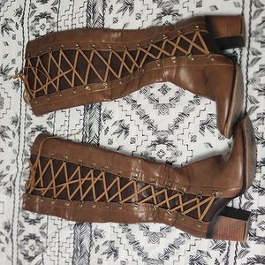 Tall riding boots, fake leather zip up.